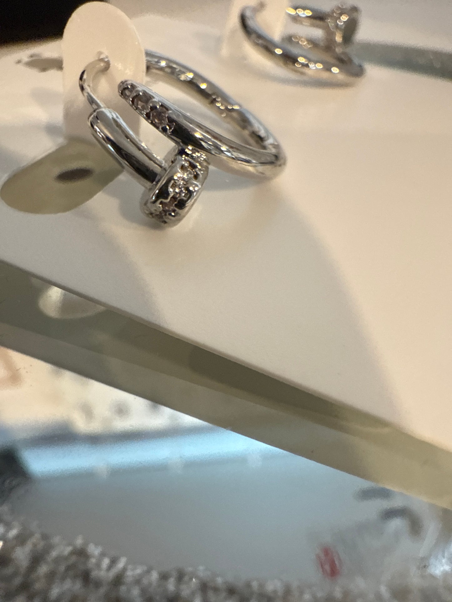 WD Spiral Nail Huggie Earrings