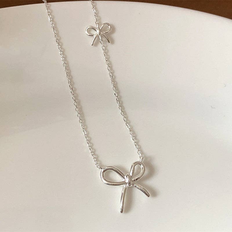 Dainty Double Bow Tie Charm Necklace in 925 Sterling Silver