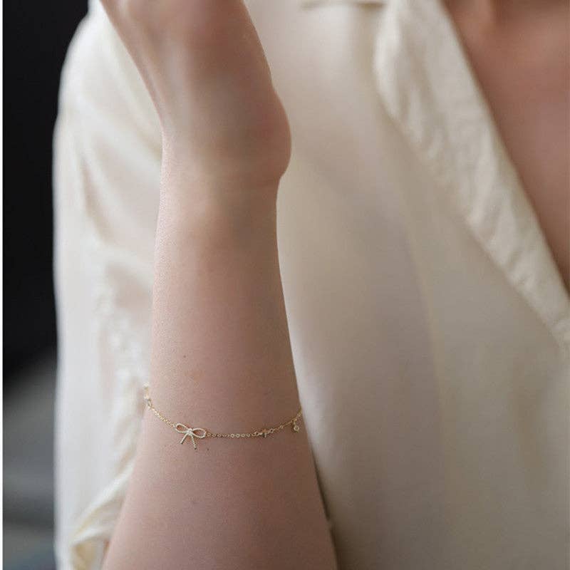 Bow Tie Four Clover Leaf Bracelet in 925 Sterling Silver
