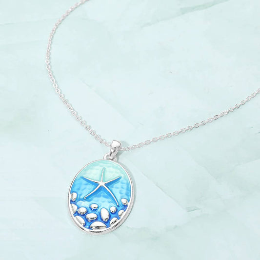 Starfish Embossed Oval Pendant Necklace